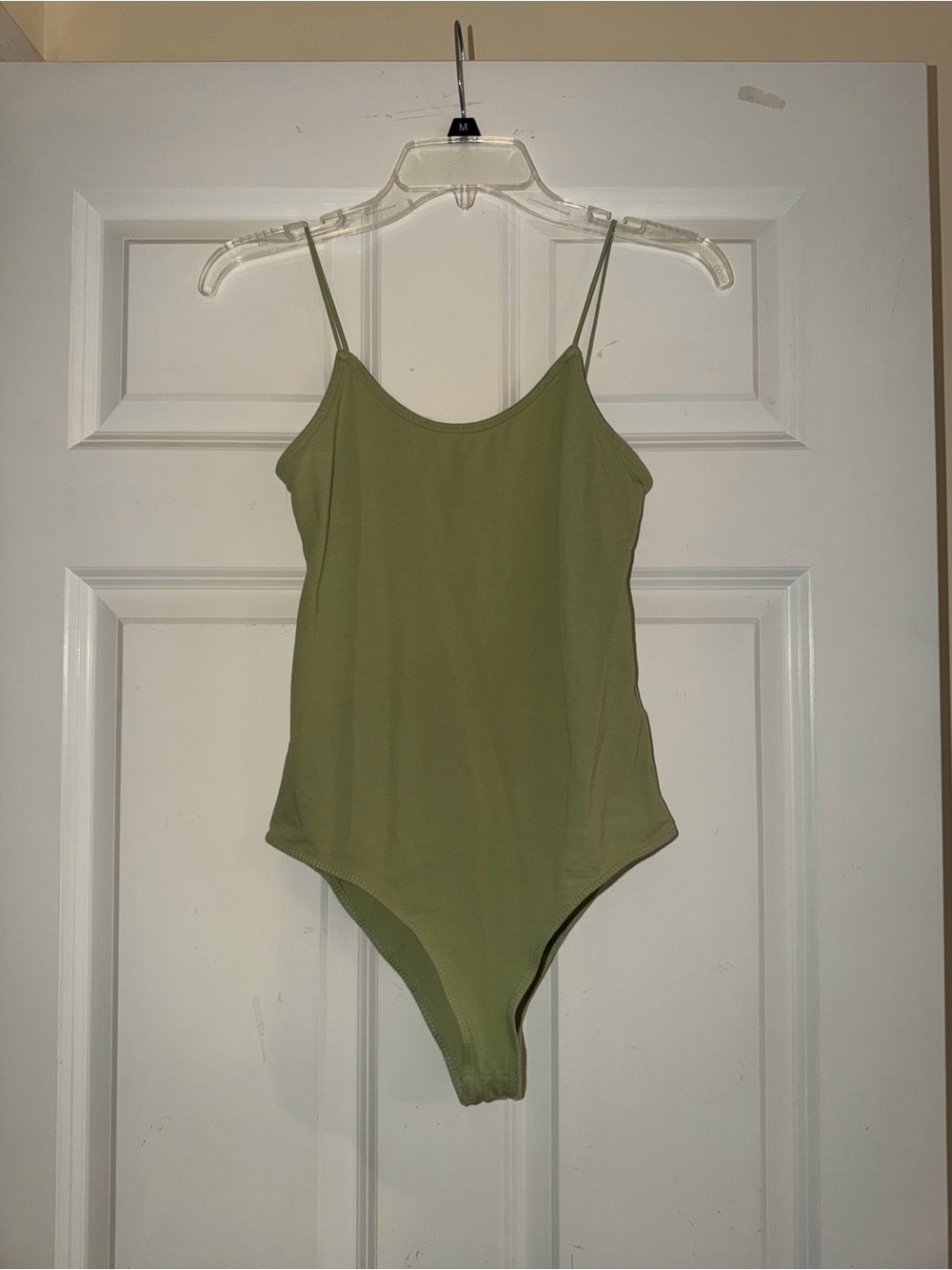 Green bodysuit